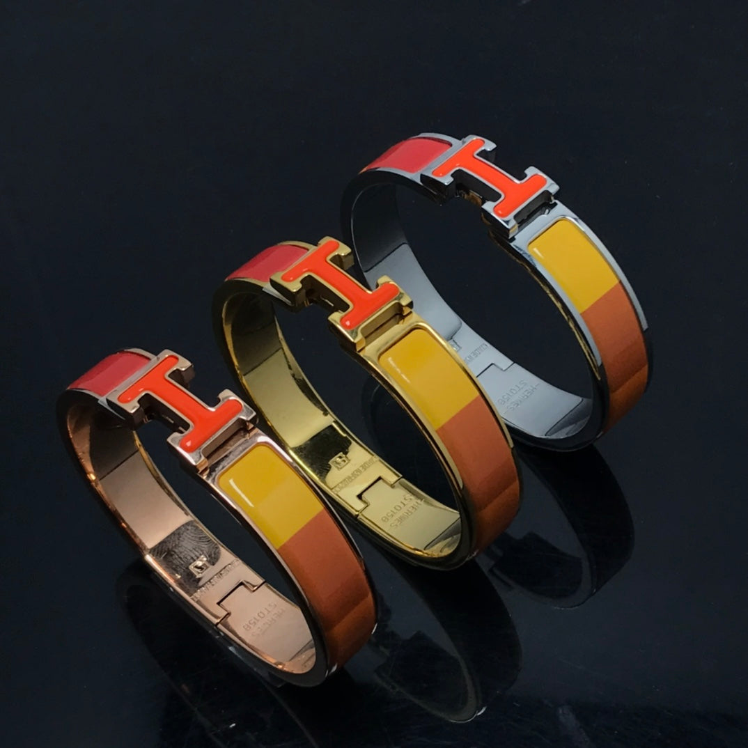 [Elitejewels]HM BRACELET ORANGE RAINBOW CERAMIC