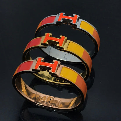 [Elitejewels]HM BRACELET ORANGE RAINBOW CERAMIC