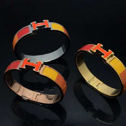 [Elitejewels]HM BRACELET ORANGE RAINBOW CERAMIC