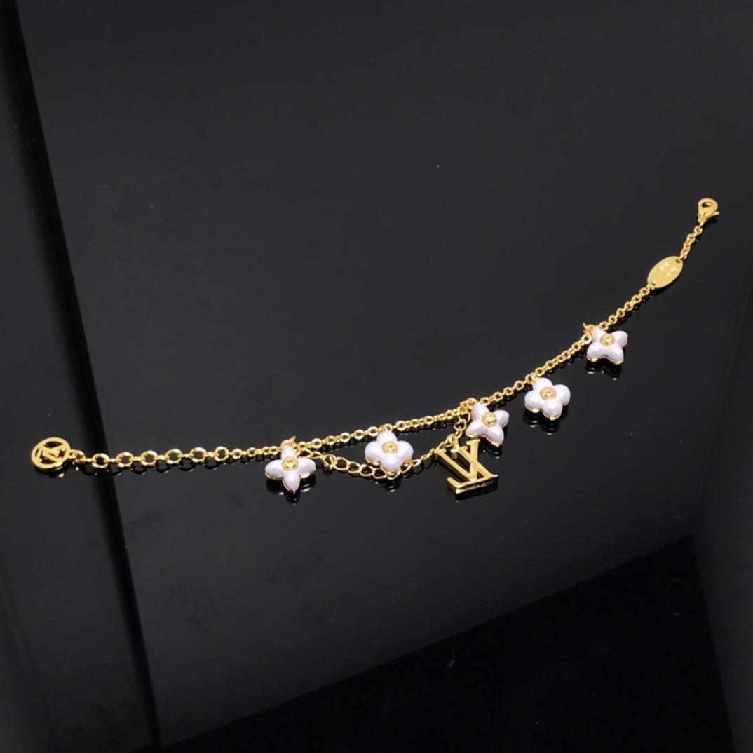 [Elitejewels]LV LOGO 6 MOTIF STAR AND SUN GOLD BRACELET
